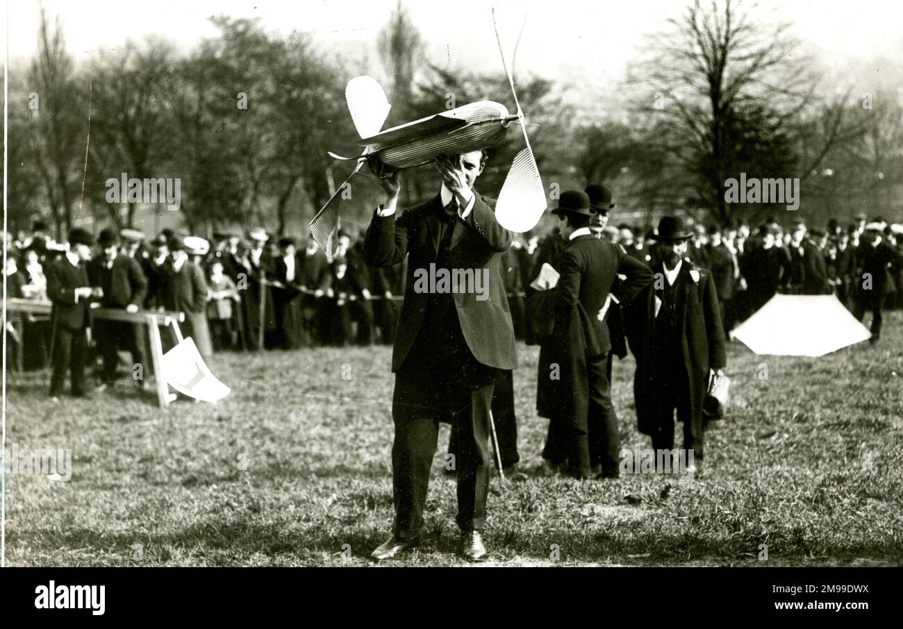 W Cochran holding his model plane at the first Aero Club Trials, Alexandra Palace, London. Stock Photo