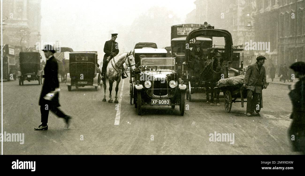 The first white line painted on a road in London, in an attempt to solve traffic congestion. Stock Photo