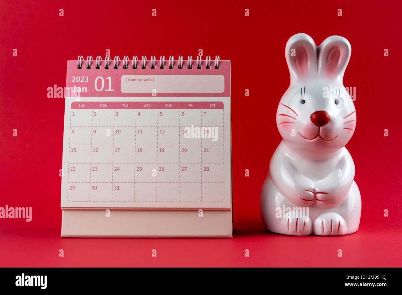 January 2023 Calendar Year of Rabbit on red background Stock Photo