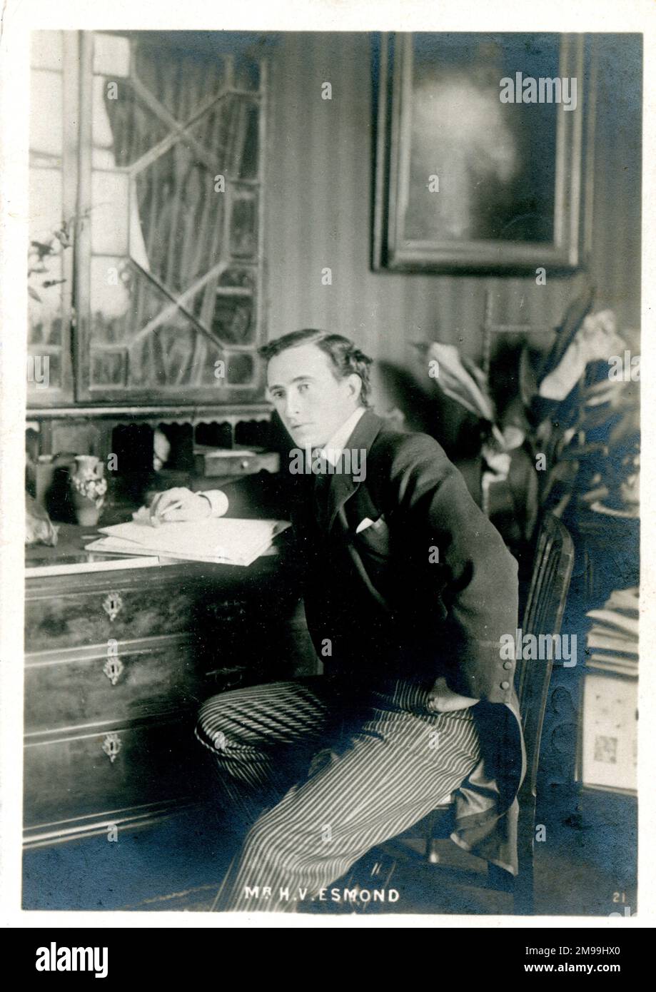 Henry Vernon Esmond (1869-1922), British actor and playwright, at his desk. Stock Photo