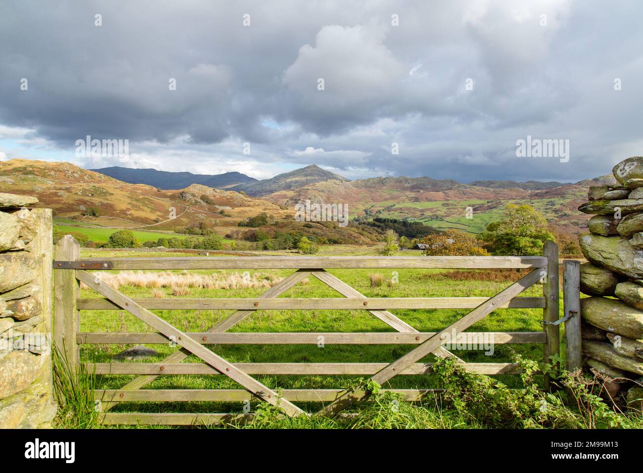 A traditional wooden gate in the Lake District, Cumbria, England, UK Stock Photo