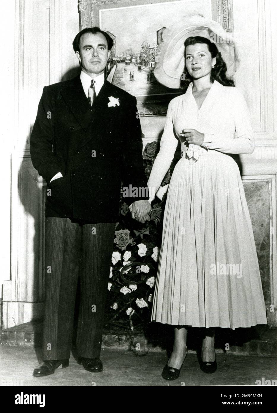 Prince Aly Khan (Prince Ali Salman Aga Khan) and Rita Hayworth, American actress and dancer, after their wedding in May 1949. Stock Photo