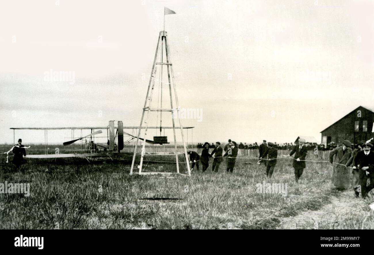 The Wright Brothers (Orville and Wilbur), American aviation pioneers, at Pau, France, where they were giving various flight demonstrations to set new records for altitude and duration. Stock Photo