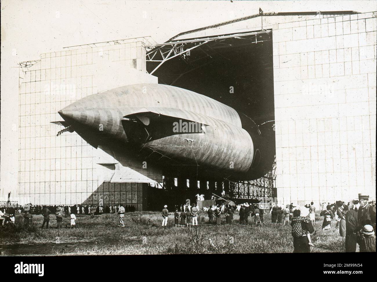 Airship coming out of shed. William Francis Forbes-Sempill, 19th Lord Sempill AFC, AFRAeS (1893-1965) was a Scottish peer and record-breaking air pioneer who was later shown to have passed secret information to the Imperial Japanese military before the Second World War. In 1921, Sempill led an official military mission to Japan that showcased the latest British aircraft. In subsequent years he continued to aid the Imperial Japanese Navy in developing its Navy Air Service and began giving military secrets to the Japanese. Although his activities were uncovered by British Intelligence, Sempill Stock Photo