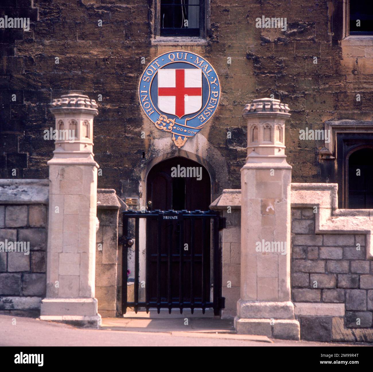 Doorway with the French maxim used as the motto of the British chivalric Order of the Garter above - Windsor, Berkshire. Stock Photo