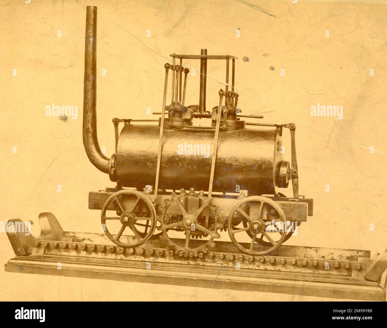 Model of Matthew Murray's steam locomotive propelled by a toothed wheel engaging in a rack on one of the rails, used 1812-1835. Stock Photo
