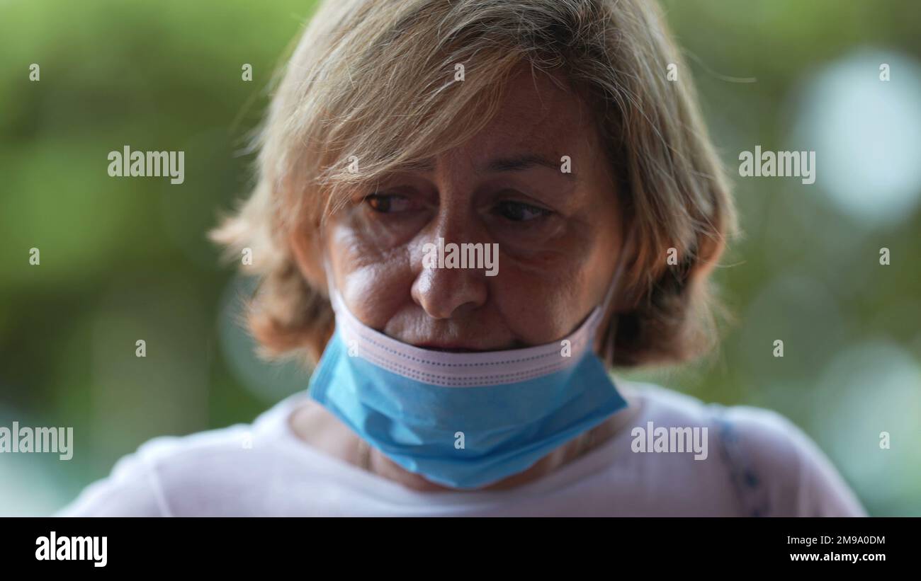 Older woman in protective mask hi-res stock photography and images - Alamy