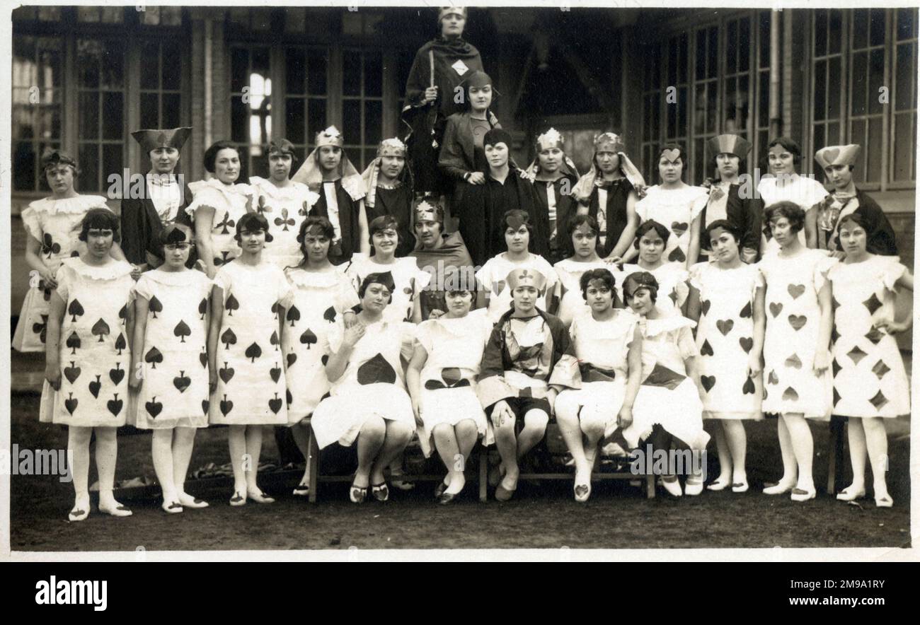 Large group of French Schoolgirls from Clermont-Ferrand posing for a photograph wearing wonderful playing card costumes - the whole deck is featured, including Kings, Queens, Jacks, Aces and  number cards of spades, clubs, hearts and diamonds! Stock Photo