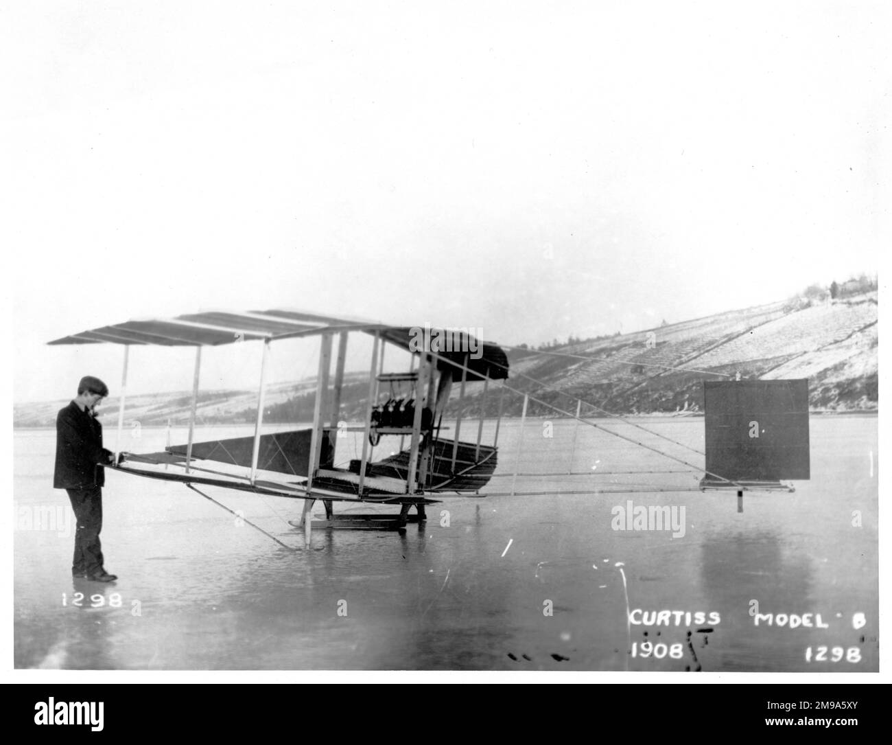 Aerial Experiment Association Aerodrome No.1 - Red Wing, seen on skids at the time of its first flight a frozen lake. The first of a series of experimental powered aircraft designed and built by the A.E.A., which had been formed by Dr. Alexander Graham Bell, with J. A. D. McCurdy (a Canadian), Lt.Thomas Selfridge of the US Army, and F. W. Casey Baldwin (not to be confused with Captain Baldwin) and Curtiss as Director of Experiments. The Aerial Experiment Association (AEA) was formally organized on 1 October, 1907, as a time-limited association for the purpose of constructing a practical aero Stock Photo