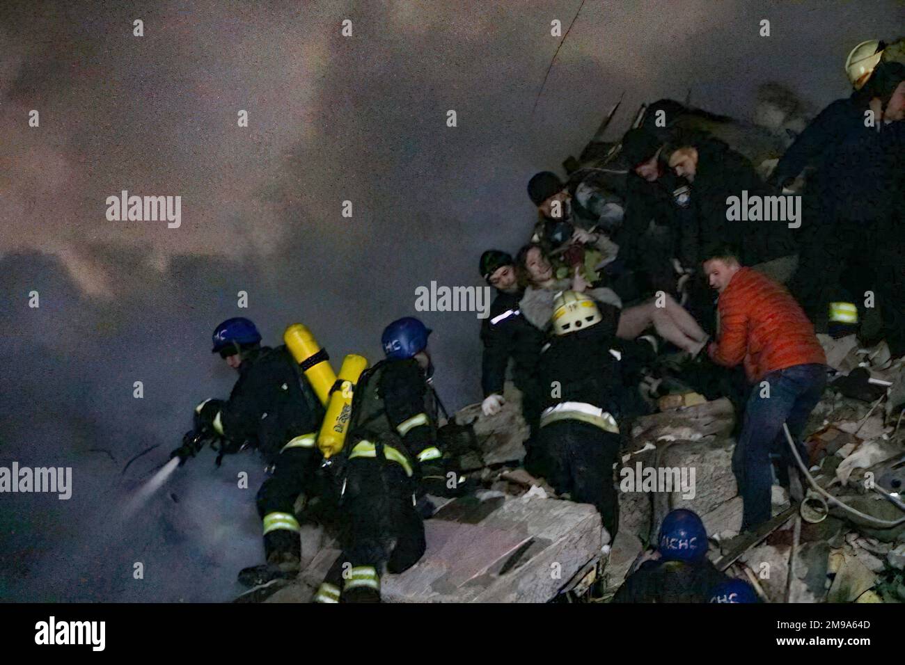 Brave rescuers of the State Emergency Service of Ukraine search through the rubble of an apartment building in Donipro, Ukraine in the aftermath of a Russian missile strike . Photo: State Emergency Service of Ukraine Stock Photo