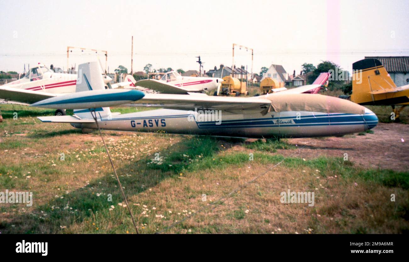 Let L-13 Blanik G-ASVS, 2-seat training glider parked among the glider tugs. Stock Photo