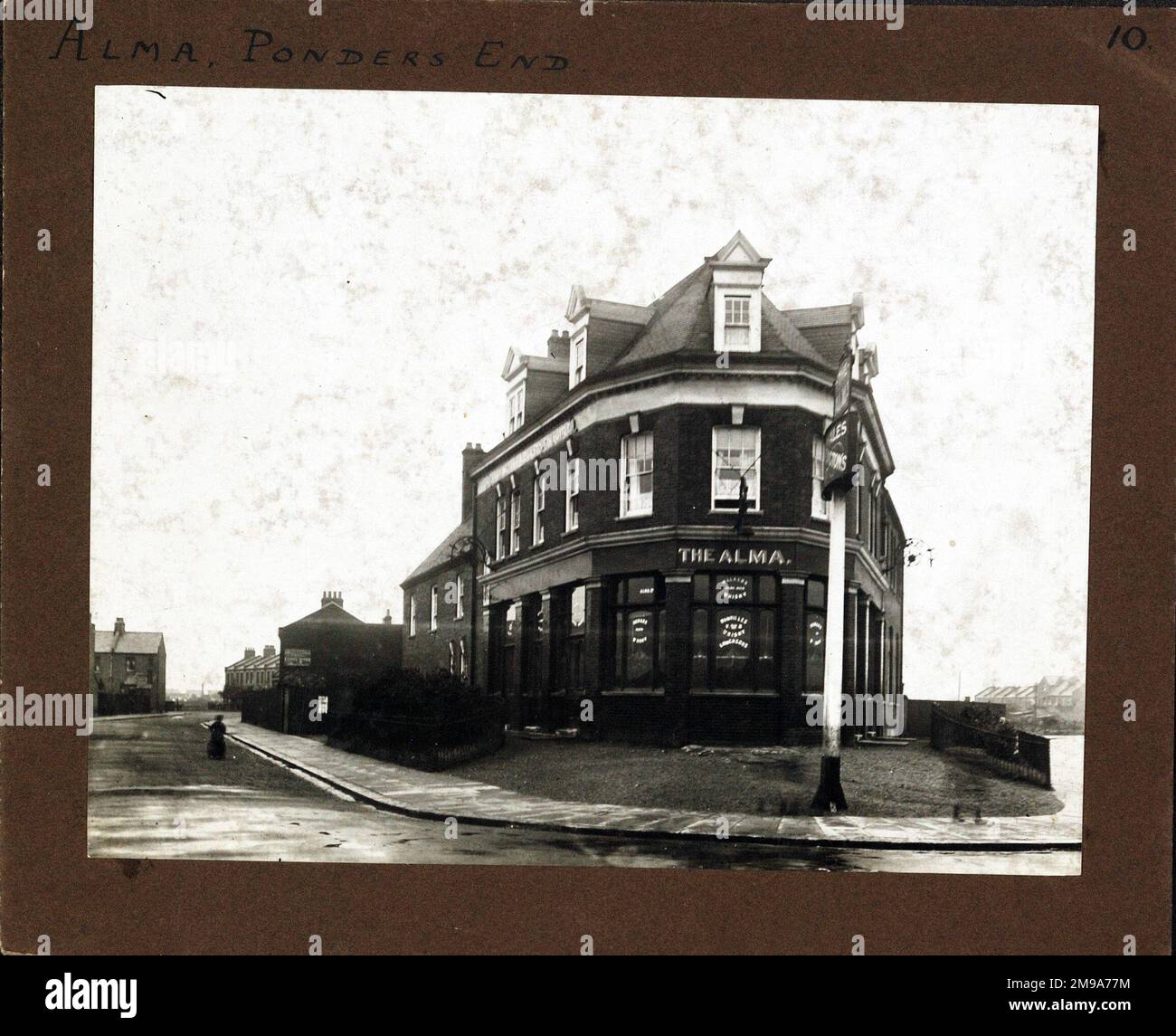 Photograph of Alma PH, Ponders End, Greater London. The main side of the  print (shown here) depicts: Face on view of the pub. The back of the print  (available on request) details