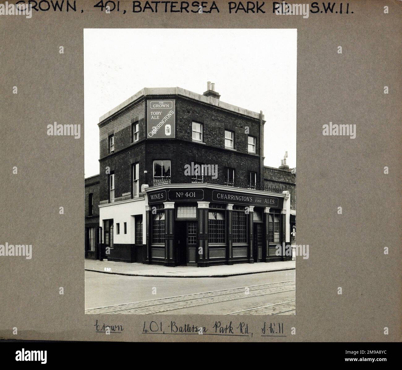 Photograph of Crown PH, Battersea, London. The main side of the print (shown here) depicts: Corner on view of the pub.  The back of the print (available on request) details: Nothing for the Crown, Battersea, London SW11 4LH. As of July 2018 . Demolished . now the site of a St Saviours Church Building Stock Photo