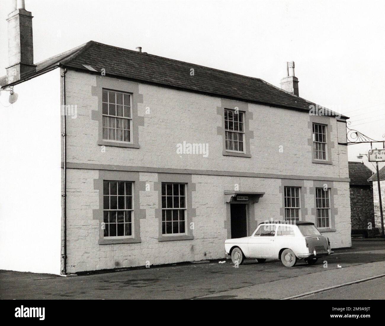 Photograph of Fir Tree Inn, Writhlington, Somerset. The main side of the print (shown here) depicts: Left Face on view of the pub.  The back of the print (available on request) details: Publican ID for the Fir Tree Inn, Writhlington, Somerset BA3 3LL. As of July 2018 . nd its original facade of Coutts Bank in the Strand Stock Photo