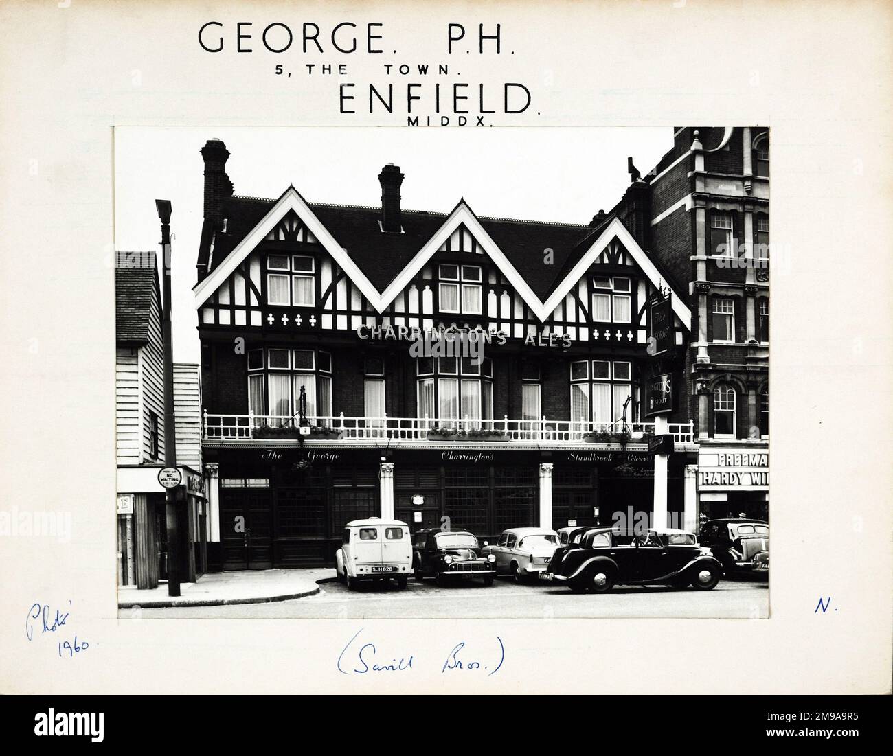 Photograph of George PH, Enfield, Greater London. The main side of the print (shown here) depicts: Face on view of the pub.  The back of the print (available on request) details: Trading Record 1938 . 1961 for the George, Enfield, Greater London EN2 6LE. As of July 2018 . O'Neills Stock Photo