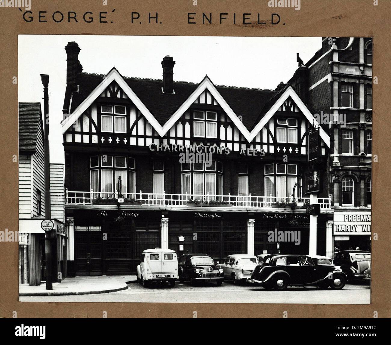 Photograph of George PH, Enfield, Greater London. The main side of the print (shown here) depicts: Face on view of the pub.  The back of the print (available on request) details: Nothing for the George, Enfield, Greater London EN2 6LE. As of July 2018 . O'Neills Stock Photo