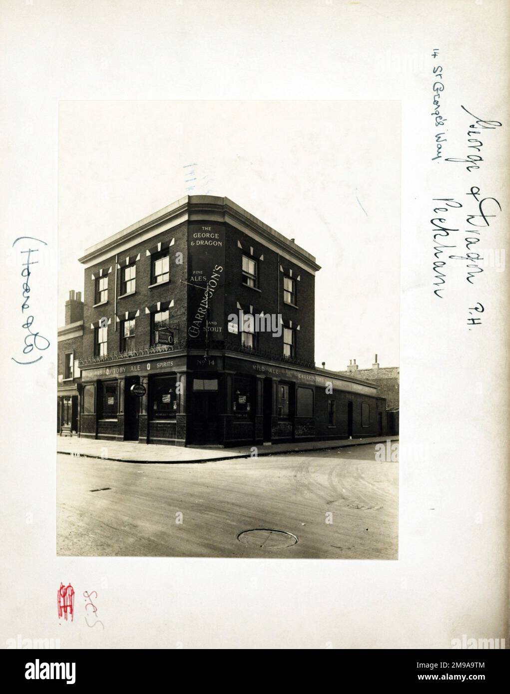 Photograph of George & Dragon PH, Peckham, London. The main side of the print (shown here) depicts: Corner on view of the pub.  The back of the print (available on request) details: Trading Record 1934 . 1961 for the George & Dragon, Peckham, London SE15 6QW. As of July 2018 . Demolished Stock Photo