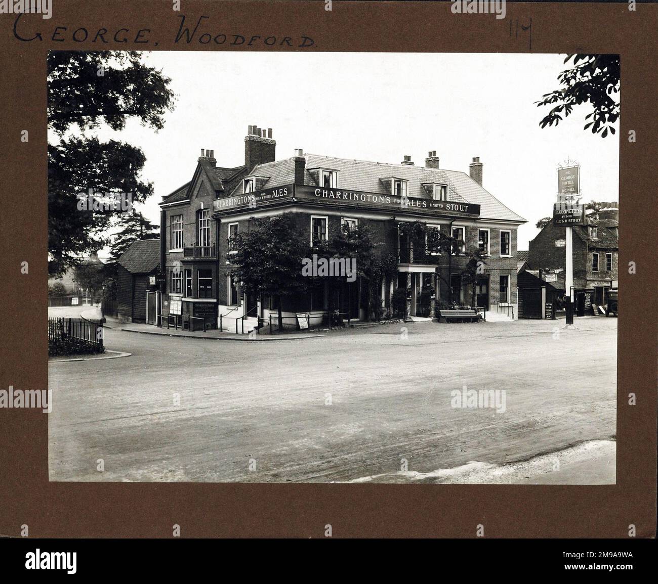 Photograph of George PH, Woodford, Greater London. The main side of the print (shown here) depicts: Corner on view of the pub.  The back of the print (available on request) details: Nothing for the George, Woodford, Greater London E18 2QL. As of July 2018 . Stonegate Pub Co Stock Photo