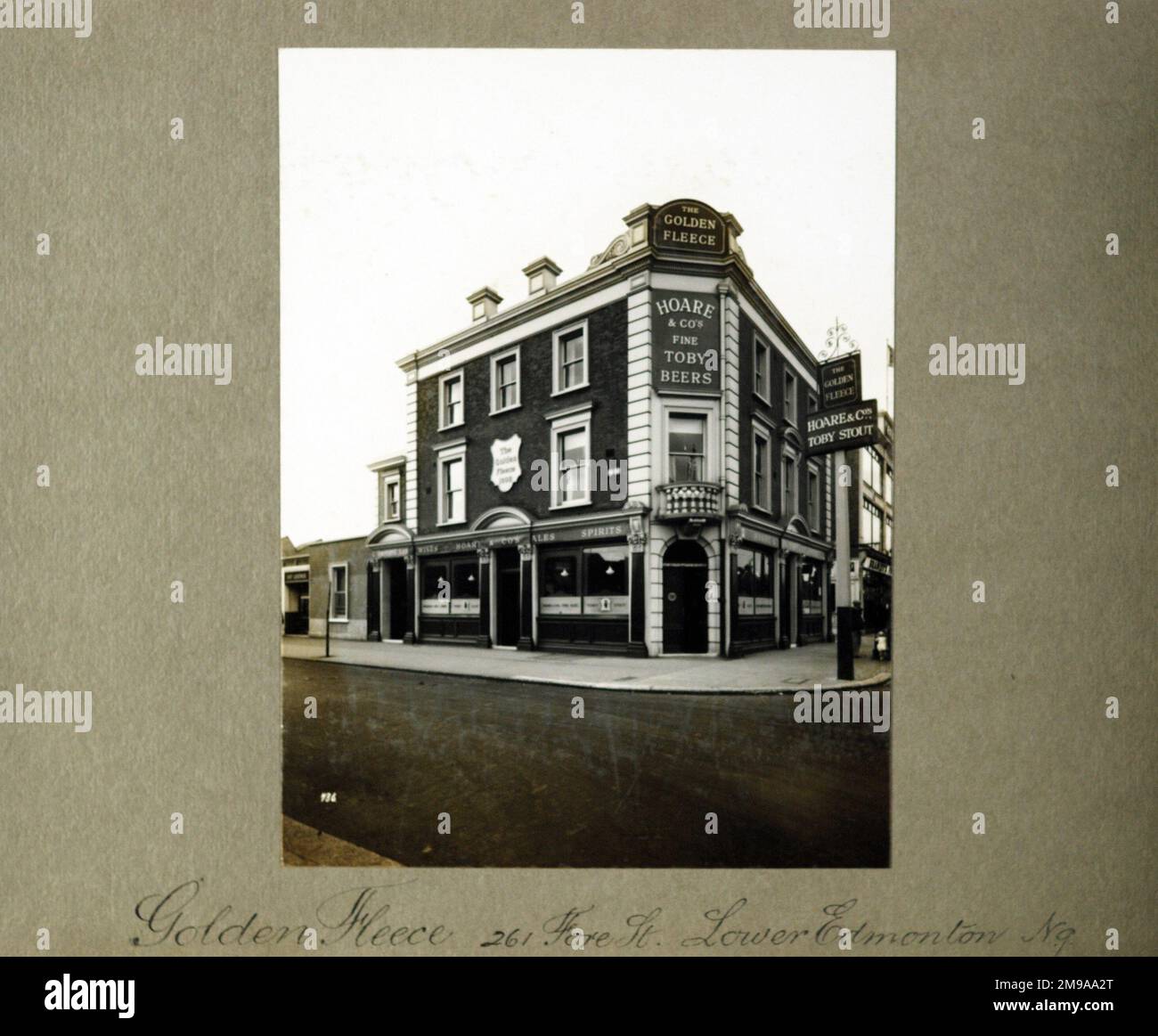 Photograph of Golden Fleece PH, Edmonton, London. The main side of the  print (shown here) depicts: Corner on view of the pub. The back of the  print (available on request) details: Nothing