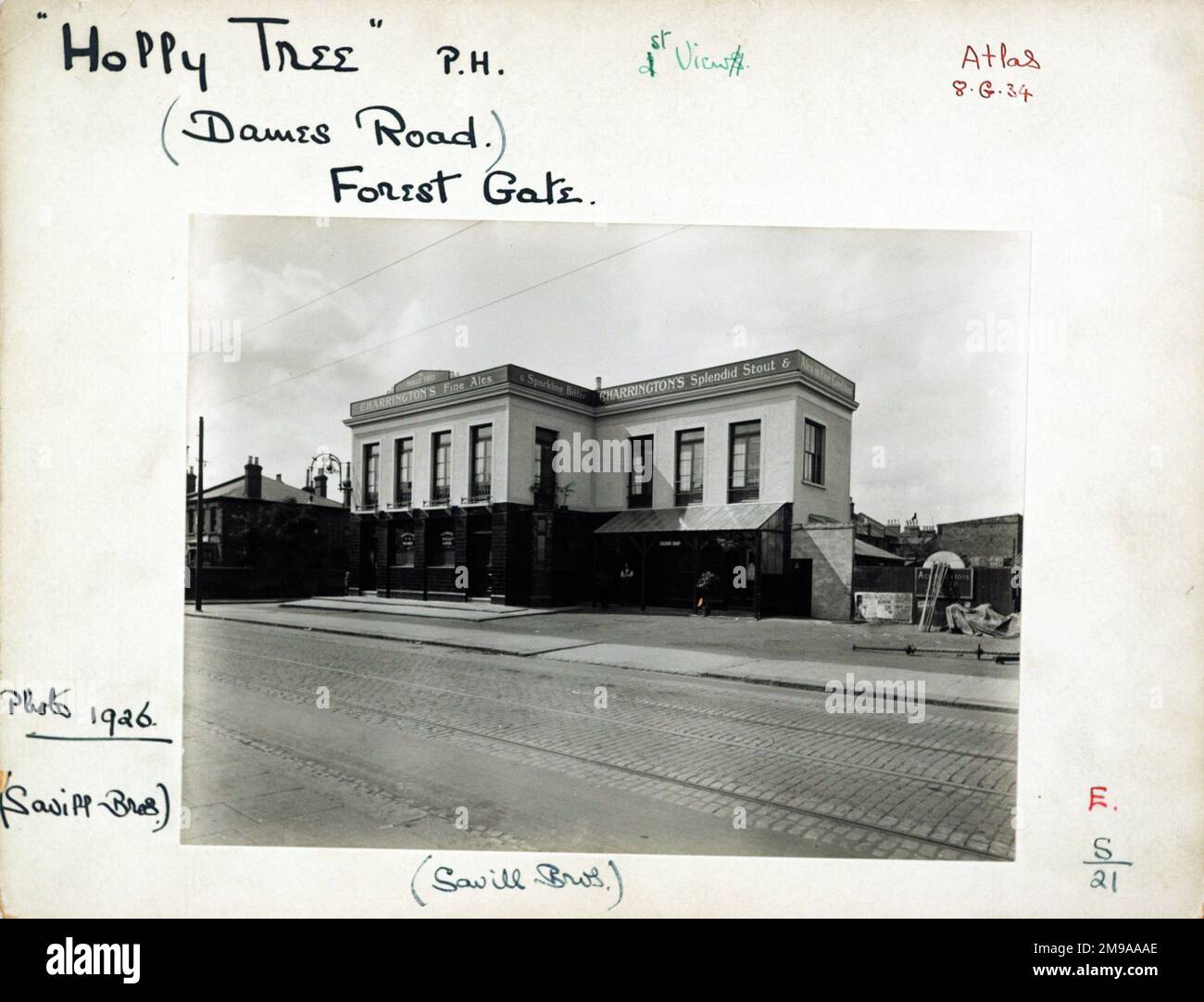 Photograph of Holly Tree PH, Forest Gate, London. The main side of the print (shown here) depicts: Right face on view of the pub.  The back of the print (available on request) details: Trading Record 1924 . 1961 for the Holly Tree, Forest Gate, London E7 0DZ. As of July 2018 . Greene King Stock Photo