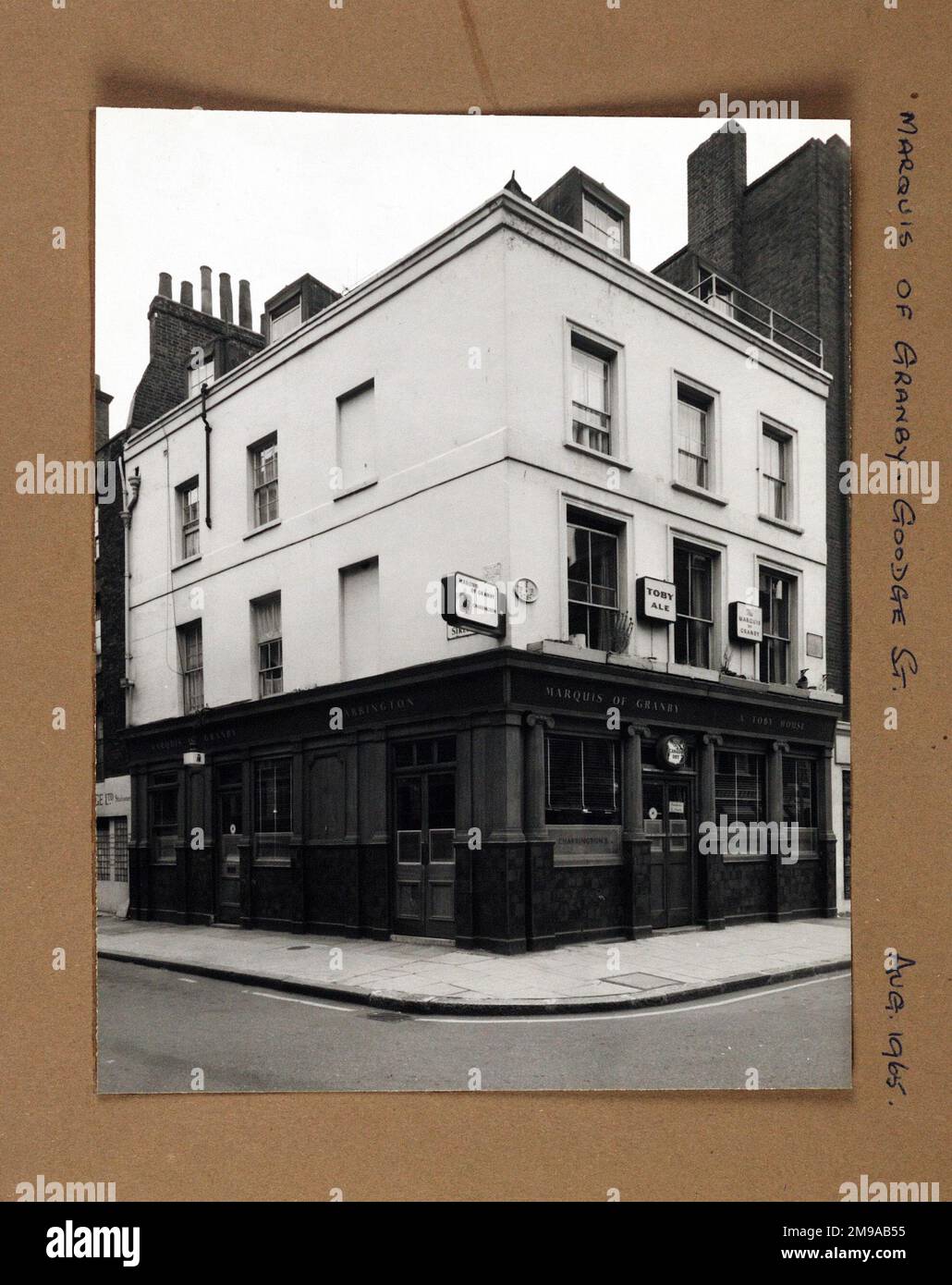 Photograph of Marquis Of Granby PH, Goodge Street, London. The main side of the print (shown here) depicts: Corner on view of the pub.  The back of the print (available on request) details: Nothing for the Marquis Of Granby, Goodge Street, London W1T 1NR. As of July 2018 . Nicholson's (Mitchells & Butlers) Stock Photo