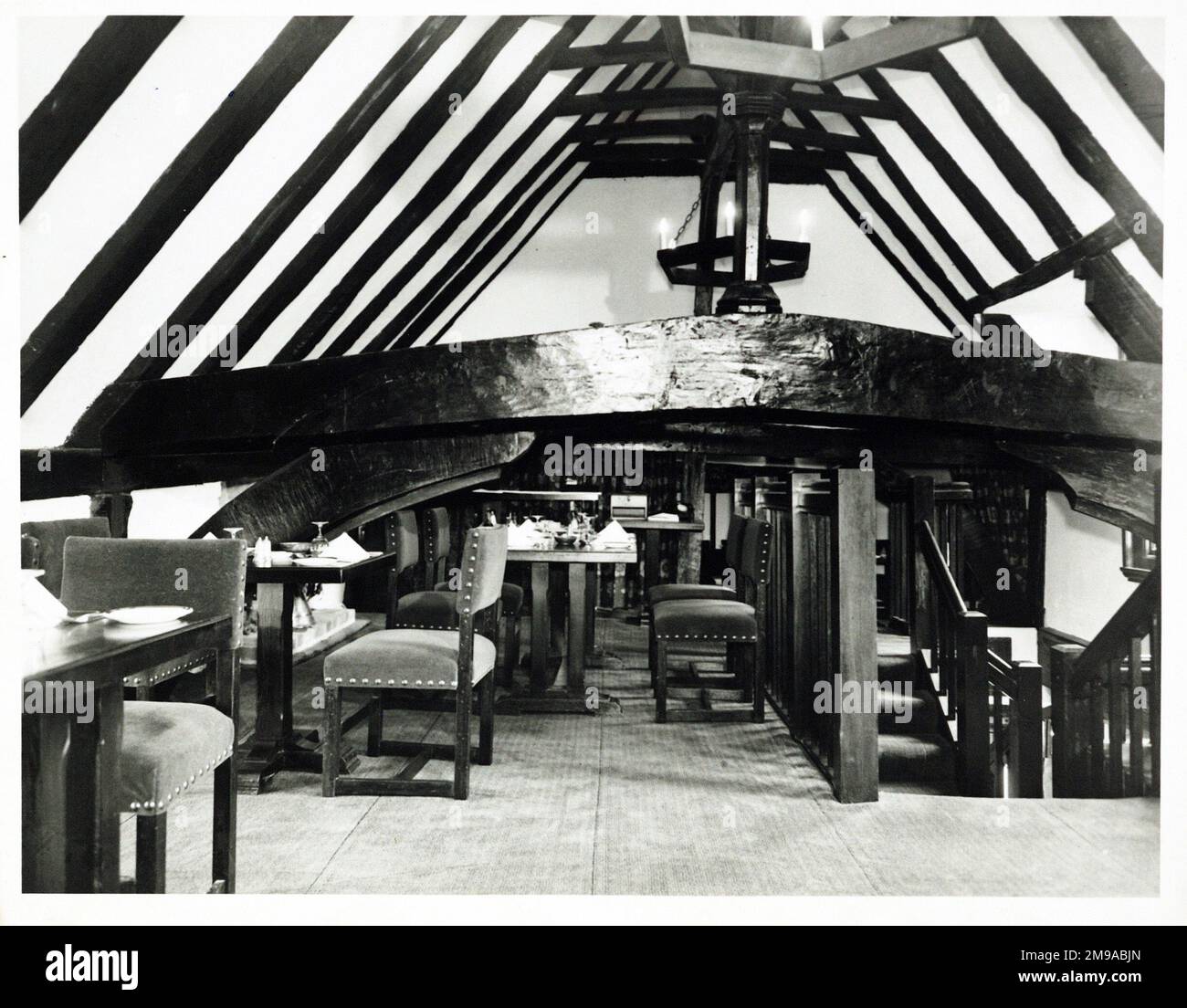 Photograph of Olde Six Bells PH, Horley, Sussex. The main side of the print (shown here) depicts: Upstairs restaurant of the pub.  The back of the print (available on request) details: Nothing for the Olde Six Bells, Horley, Sussex RH6 8AD. As of July 2018 . Vintage Inns (Mitchells & Butlers) Stock Photo