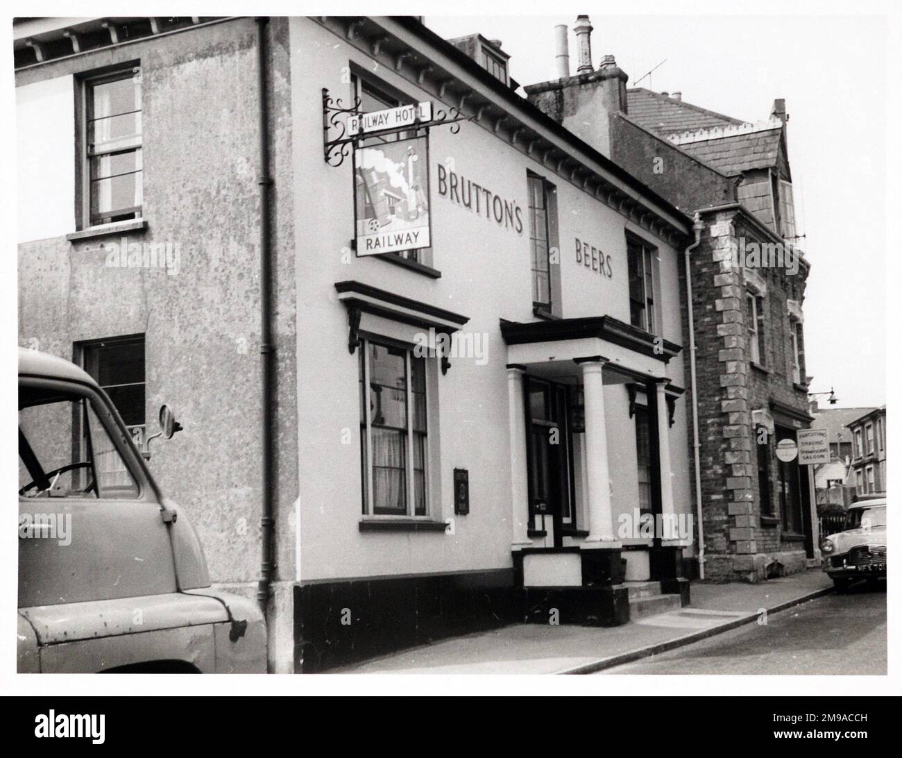 Photograph of Railway Hotel, Blandford, Dorset. The main side of the print (shown here) depicts: Left Face on view of the pub.  The back of the print (available on request) details: Publican ID for the Railway Hotel, Blandford, Dorset DT11 7EX. As of July 2018 . Free House as of June 2016 boarded up and for sale Stock Photo