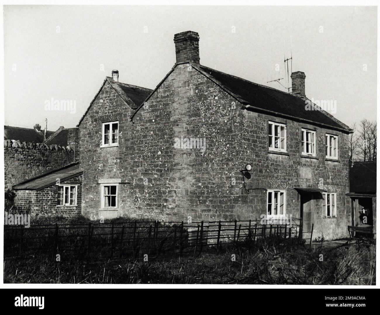 Photograph of Rising Sun Inn, Yeovil, Somerset. The main side of the print (shown here) depicts: Left Face on view of the pub.  The back of the print (available on request) details: Publican ID for the Rising Sun Inn, Yeovil, Somerset BA22 8UG. As of July 2018 . Now in residential use Stock Photo