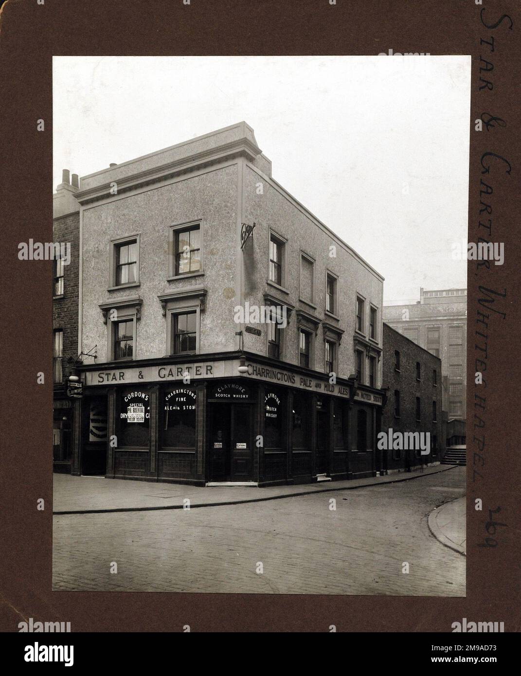 Photograph of Star & Garter PH, Whitechapel, London. The main side of the print (shown here) depicts: Corner on view of the pub.  The back of the print (available on request) details: Nothing for the Star & Garter, Whitechapel, London E1 1DB. As of July 2018 . Whitechapel Fried Chicken since 2001 Stock Photo
