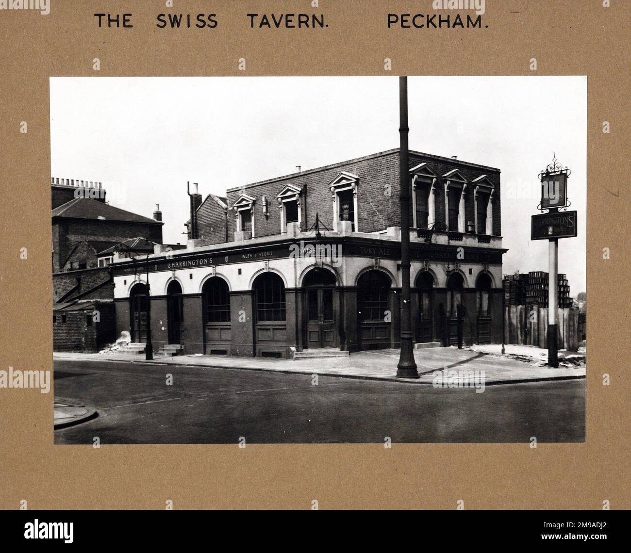 Photograph of Swiss Tavern , Peckham, London. The main side of the print (shown here) depicts: Corner on view of the pub.  The back of the print (available on request) details: Nothing for the Swiss Tavern, Peckham, London SE15 2HU. As of July 2018 . Closed and converted to block of flats Stock Photo