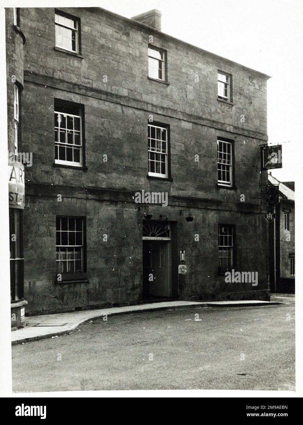 Photograph of White Hart Hotel, Martock, Somerset. The main side of the print (shown here) depicts: Left Face on view of the pub.  The back of the print (available on request) details: Publican ID for the White Hart Hotel, Martock, Somerset TA12 6JQ. As of July 2018 . Family run pub Stock Photo