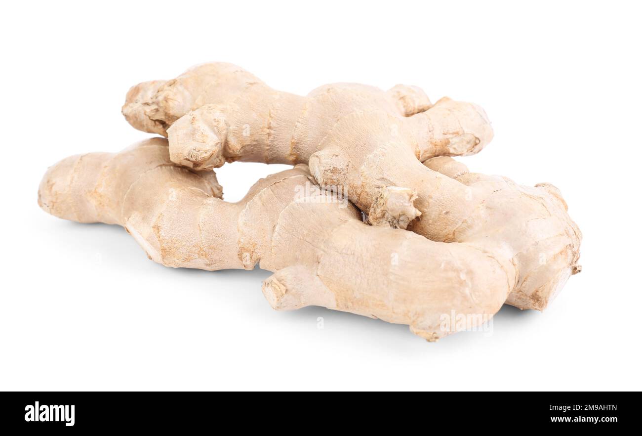 Fresh ginger roots on white background Stock Photo - Alamy