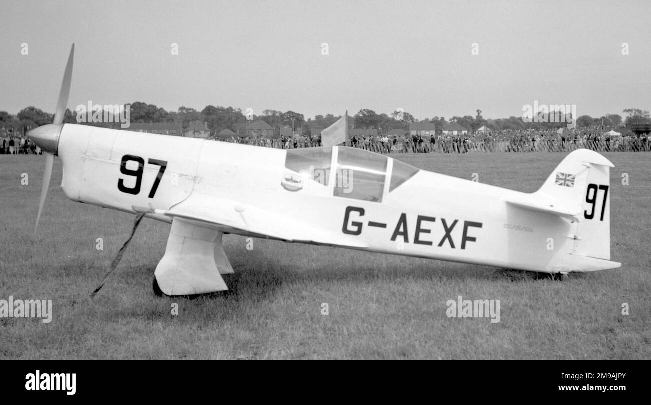 Percival E.2H Mew Gull G-AEXF (msn E.22), race number 97, competing in the National Air Races at Southend on 20 June 1953, with a modified lower canopy. Stock Photo