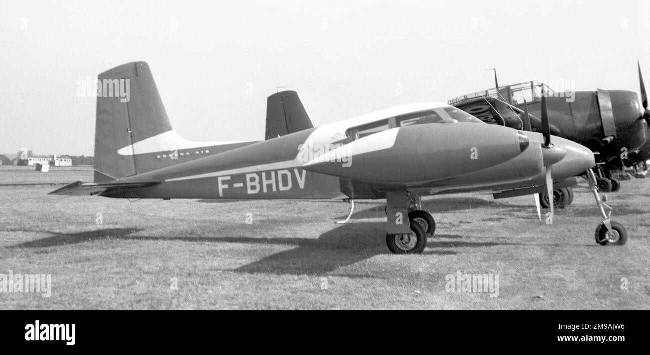Cessna 310 F-BHDV (msn 35068), of Societe Turbomeca, at Blackbushe Airport 5-11 September 1955, parked for visiting the SBAC Farnborough Airshow, in company with two Royal Naval Reserve Grumman Avenger AS.4s. Stock Photo
