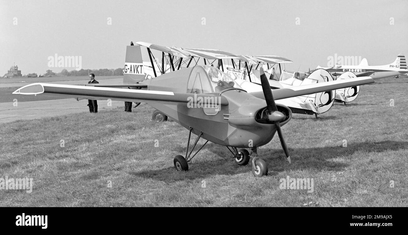 Tipsy Nipper Mk.III G-AVKT (msn 70), prototype of the Mark III, at an air display in the Netherlands, circa 1969, parked next to 'Le Manchots' (the Penguins) aerobatic display team. On 19 August 1972 the aircraft was taking part in a display in which it was to attempt to cut paper streamers; these were carried in the form of toilet rolls in the cockpit and were dropped by the pilot. The first rolls were dropped when the aircraft was 800 feet above the ground and these were successfully cut. Another roll was dropped from only 200 feet and the pilot attempted to turn back to cut the streamer i Stock Photo