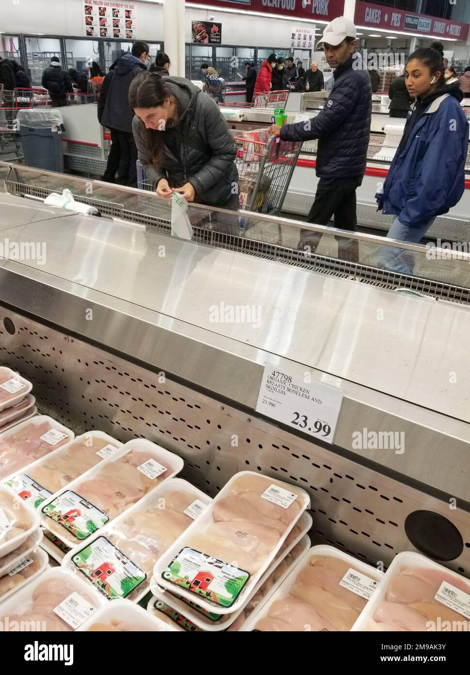 Vancouver, Canada. 17th Jan, 2023. Customers shop for food at a Costco