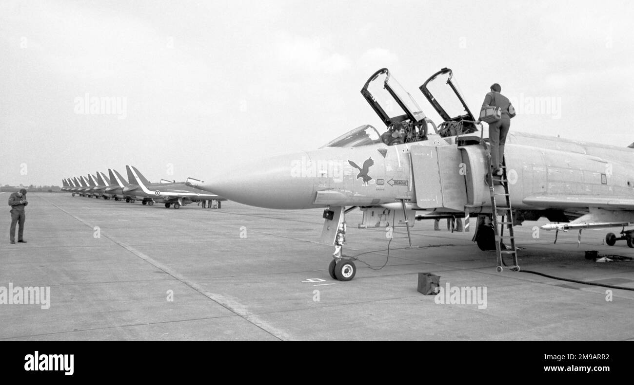 Royal Air Force - McDonnell Douglas Phantom FGR.2 XV410, of No.23 Squadron, on the line at RAF Wattisham with the Hawks of the Red Arrows. Shortly after this photo was taken, 23 Squadron deployed to RAF Stanley in the Falkland islands, to provide Air Defence and Close Support for British Forces Falkland Islands (BIFFI). Stock Photo