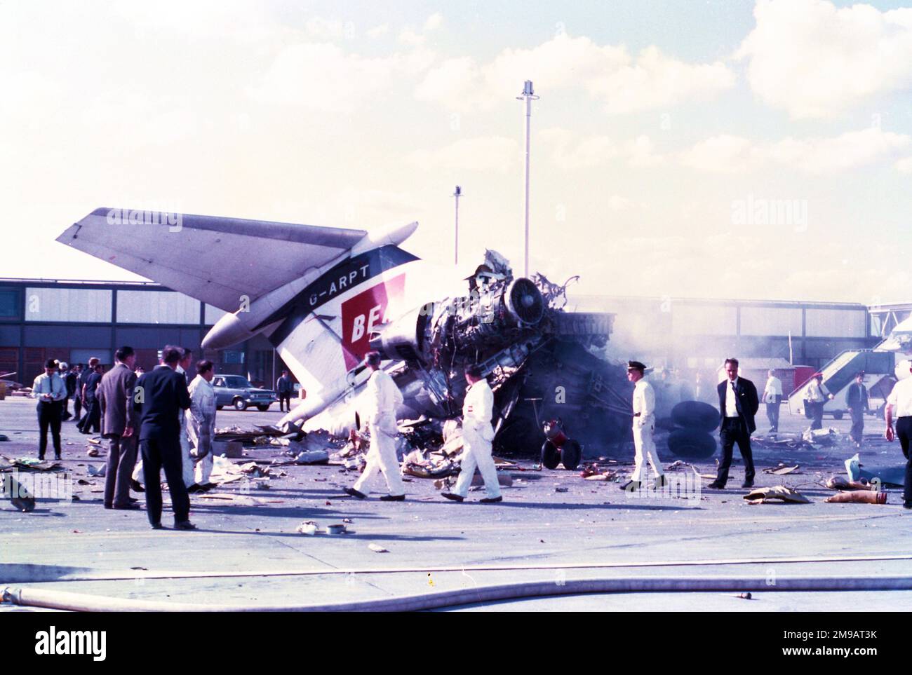 Hawker Siddeley Trident 1C G-ARPT (msn 2121), of British European Airways, at London Heathrow Airport, after the crash of BKS Air Transport Airspeed Ambassador G-AMAD on 3 July 1968. Airspeed Ambassador, G-AMAD, was flying a cargo of 8 horses from Deauville to London. When approaching the runway 28R threshold at London Airport, the left wing suddenly dropped. The wing-tip, followed by the left main gear wheels touched the grass to the left of the runway. The crew tried to increase power to go around, but the aircraft flew on with an increasing bank angle. The plane struck two parked BEA HS-1 Stock Photo