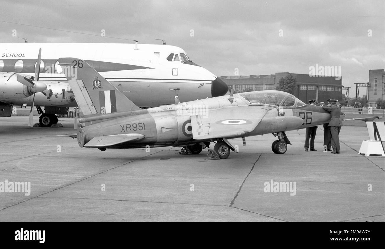 Royal Air Force - Folland Gnat T.1 XR951 '26' (msn FL568), of No.4 Flying Training School, at RAF Finningley in September 1969, parked next to the Empire Test Pilot School Viscount 744 XR801. Stock Photo