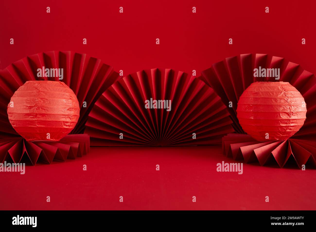 Chinese New Year product display background with lanterns and paper fan. Translation Let ten