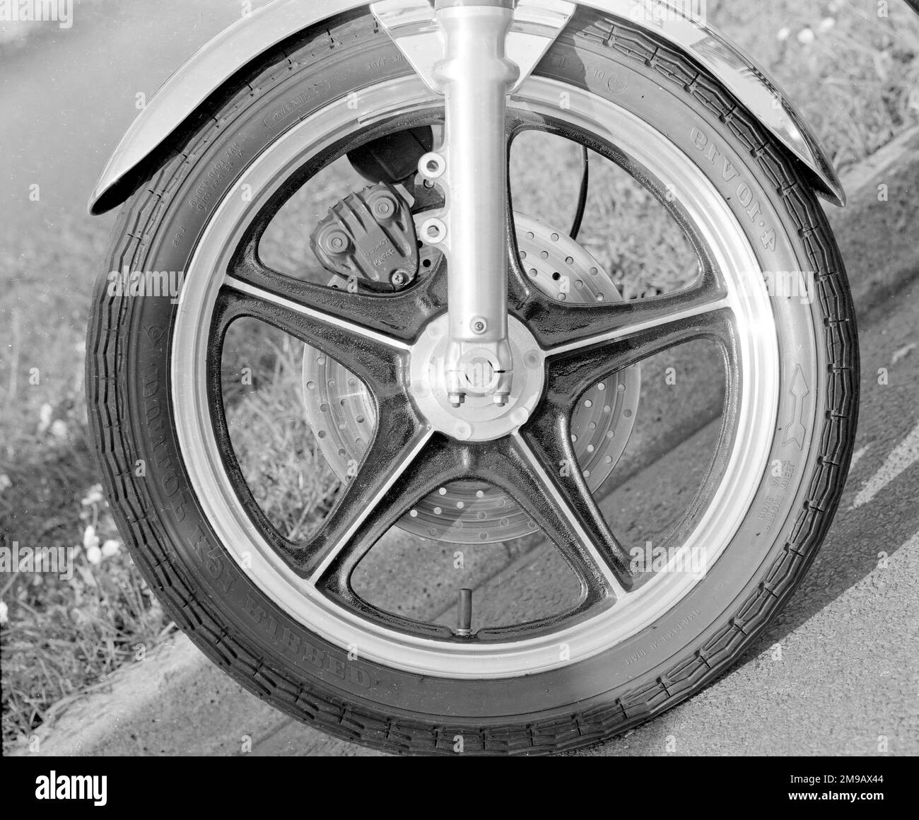 Kawasaki 500 Mach III motorcycle front wheel. Stock Photo