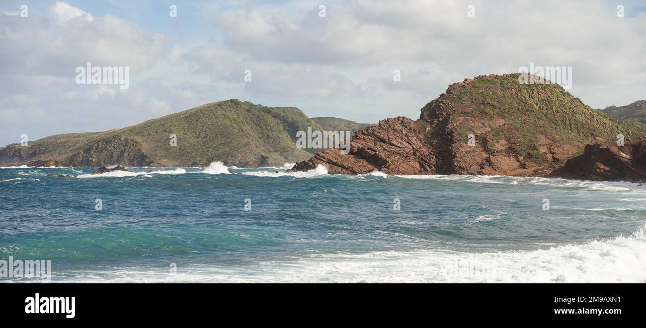 Cami de Valls, Pebble beach Macar d'Alfurinet, hiking trails of Menorca, GR 223, Algaiarens, Balearic islands, Spain. Stock Photo