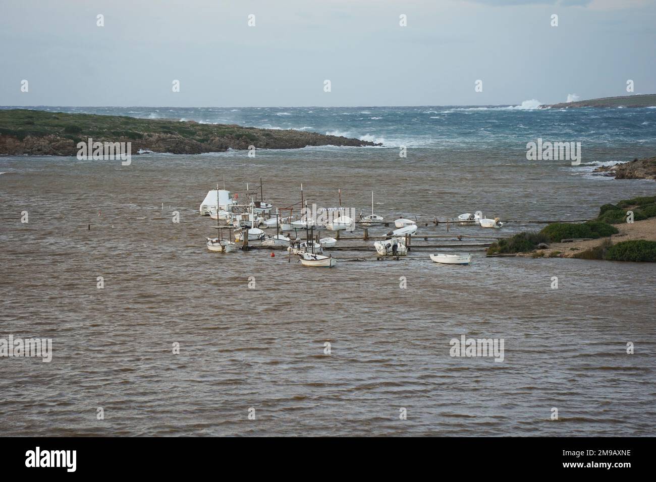 Port de Sanitja, port of, Sanitja with small fishing boats, Menorca, Balearic islands, Spain. Stock Photo