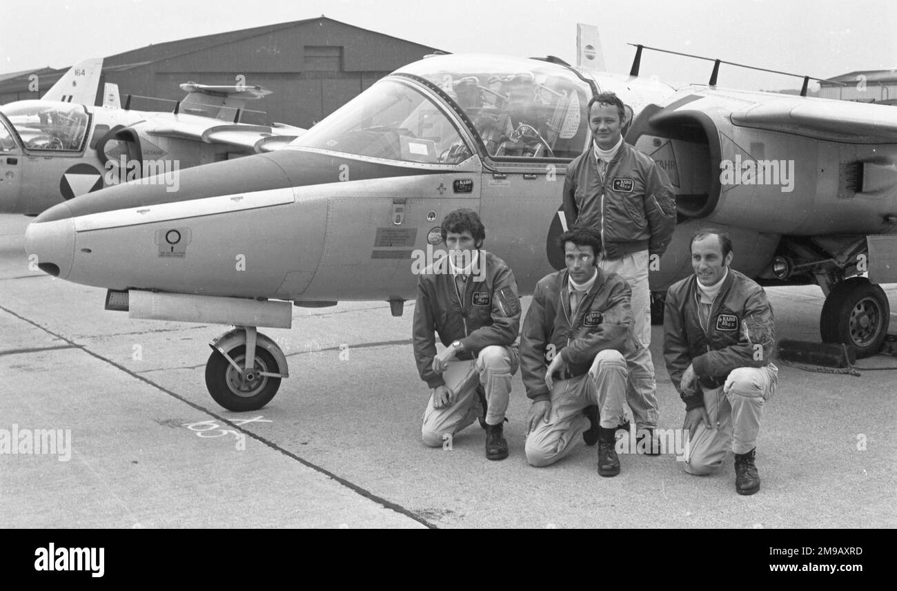 Austrian Air Force - SAAB 105O, of the 'Karo AS' aerobatic team, with the pilots posing in front one of their aircraft. Karo AS' was formed in 1975, flying four SAAB 105O trainers, but disbanded in 1984. Stock Photo