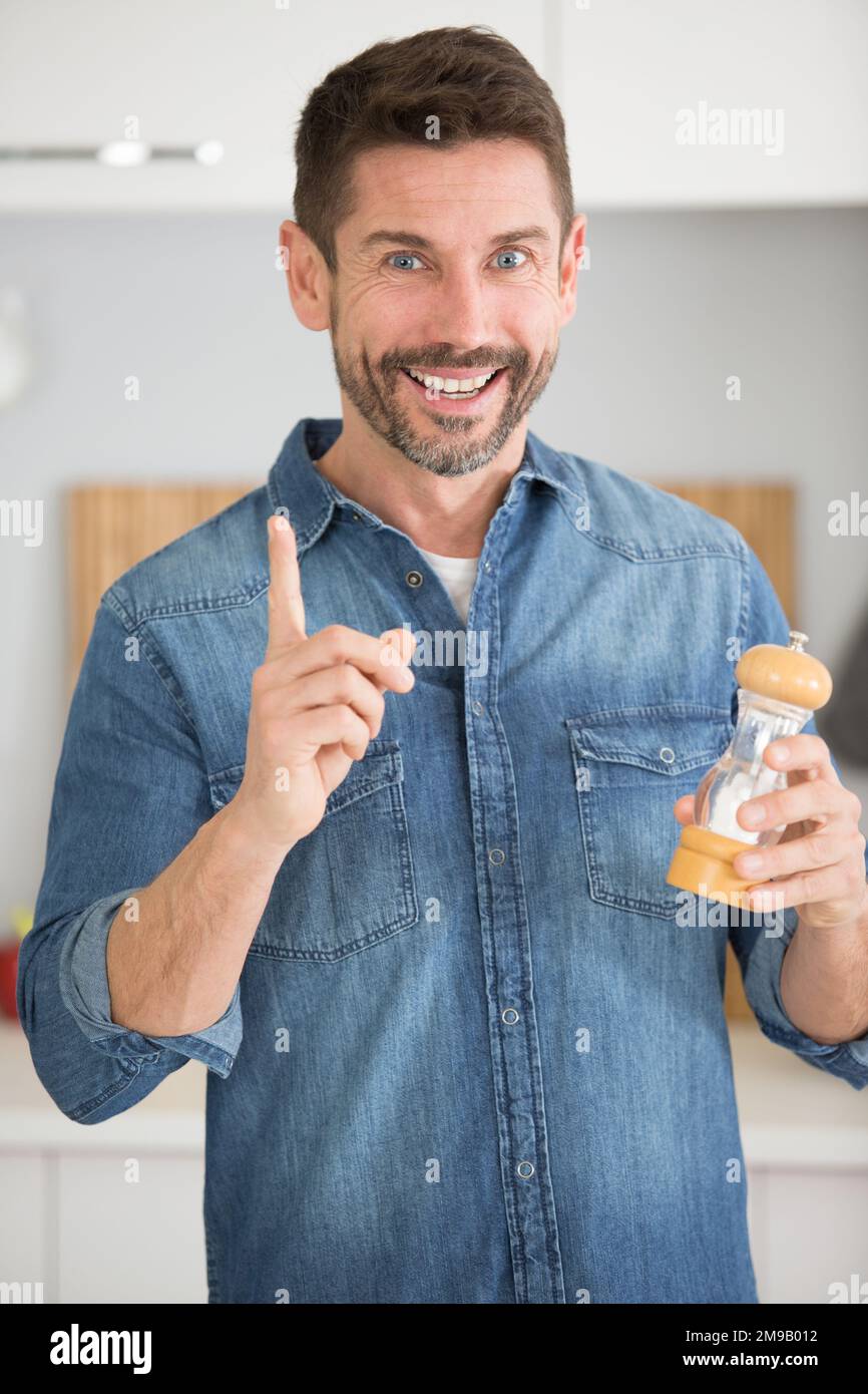 happy man holding salt Stock Photo
