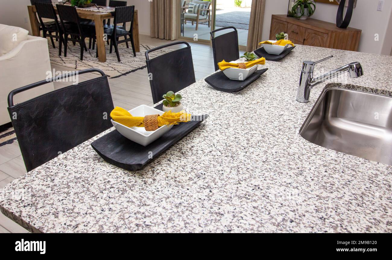Kitchen Island Counter Top with Three Place Settings Stock Photo Alamy