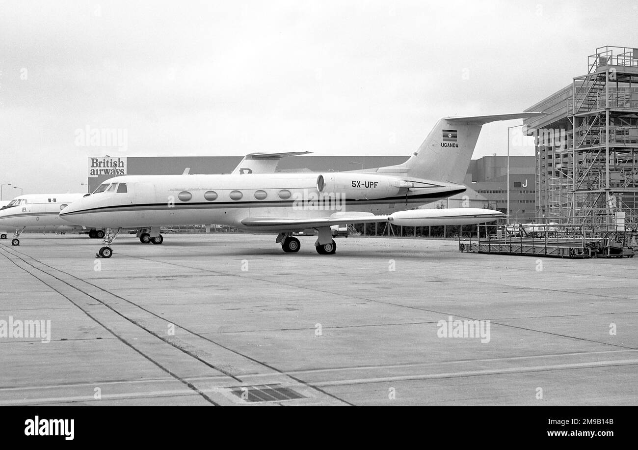 Grumman G-1159 Gulfstream II 5X-UPF (msn 133), of the Government of Uganda-Uganda Presidential Flight, at London Heathrow Airport, after being equipped with tip-tanks. Stock Photo