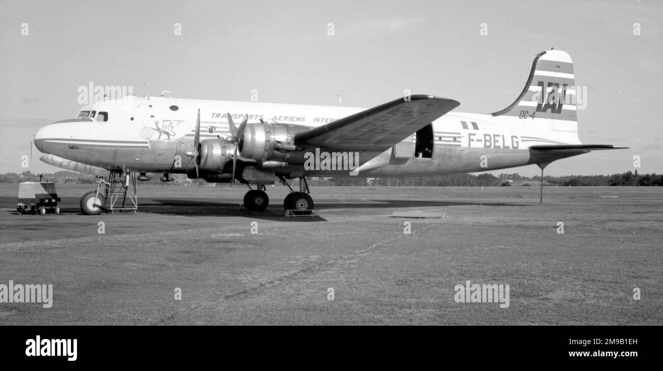 Douglas DC-4 F-BELG (msn 10392, ex USAAF C-54A-15DC 42-72287), of TAI (Transports Aeriens Intercontinentaux), at Whenuapai, on 14 April 1962. (Possibly under lease to European Air Transport). Stock Photo