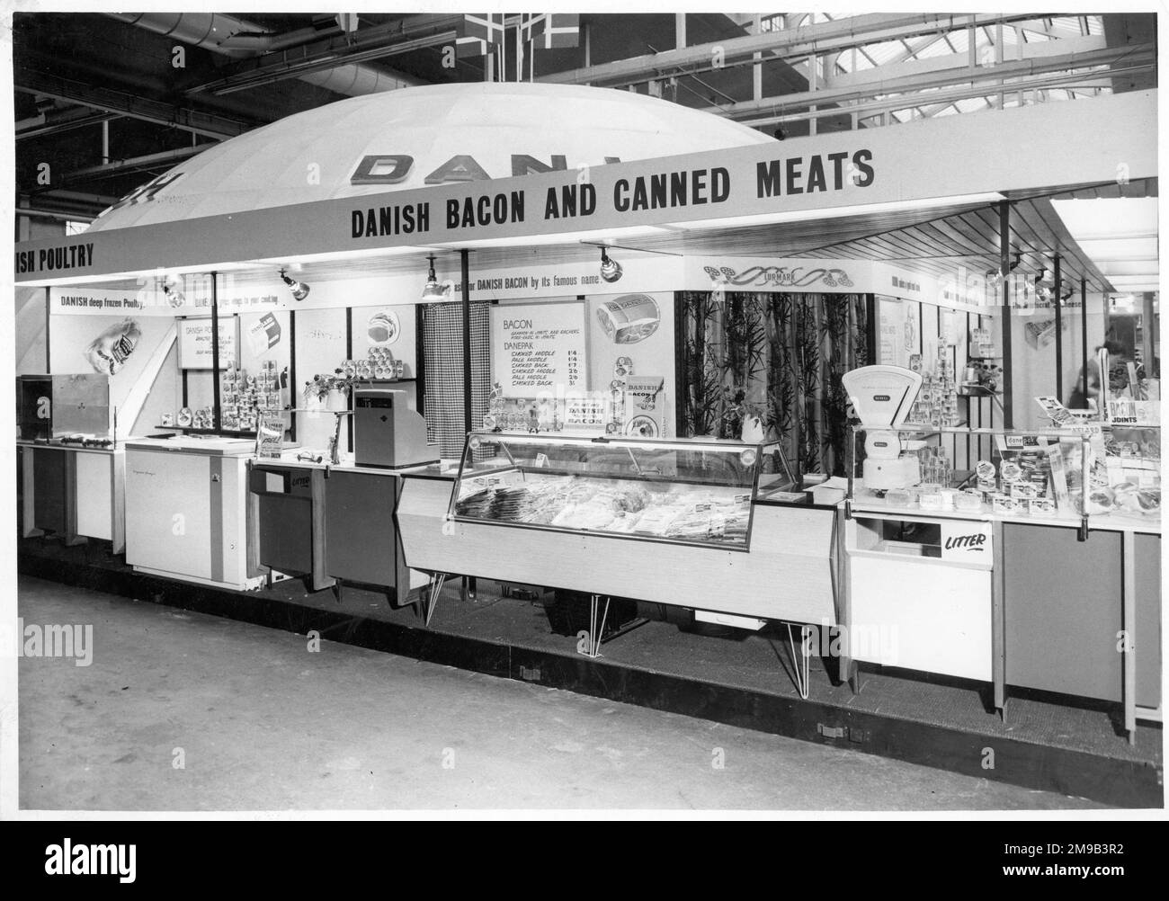 Indoor market stall for Danish Bacon and canned meats Stock Photo Alamy