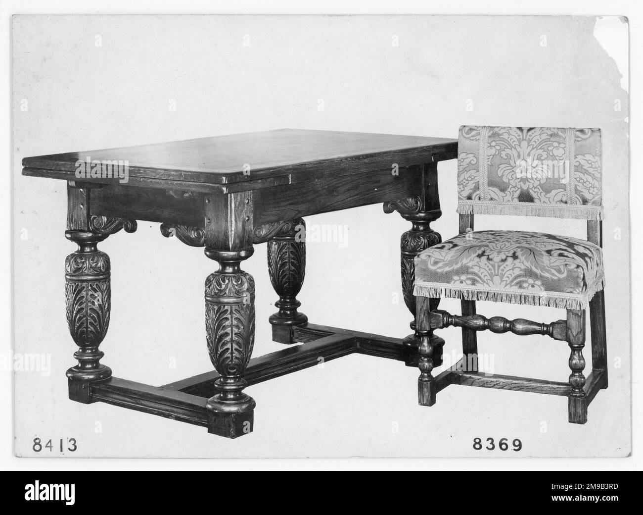 Table and chair from a furniture showroom catalogue, numbered as number 8413 and number 8369, respectively. Stock Photo